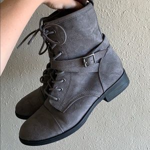 Grey boots with a buckle